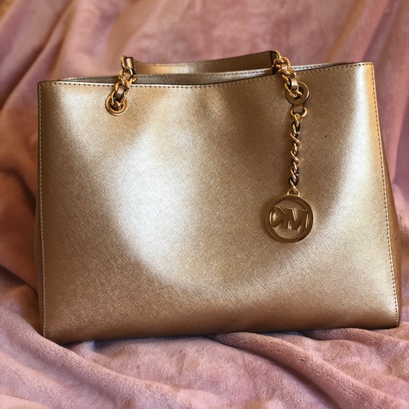 Michael Kors Handbags - Michael Kors gold purse
